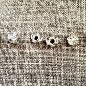 Pandora charms, priced separately